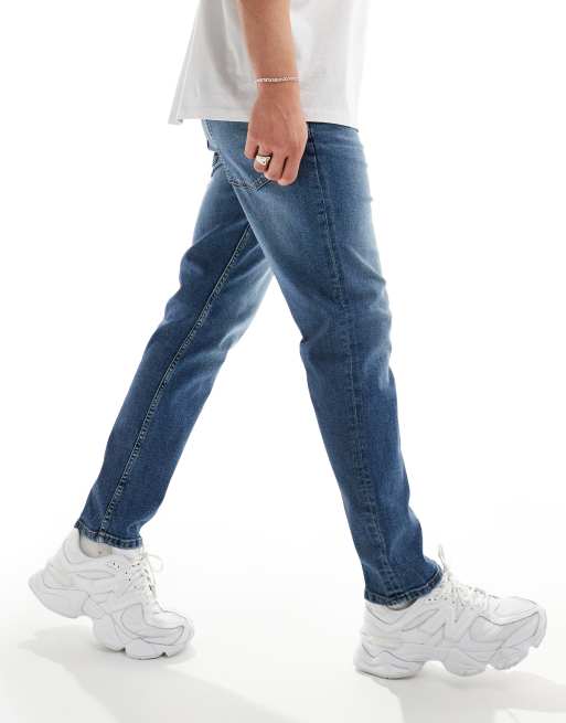 ASOS DESIGN slim jeans in mid blue, 2 of 5