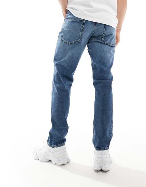 ASOS DESIGN slim jeans in mid blue, 3 of 5