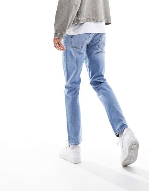 ASOS DESIGN slim jeans in mid wash blue, 2 of 5