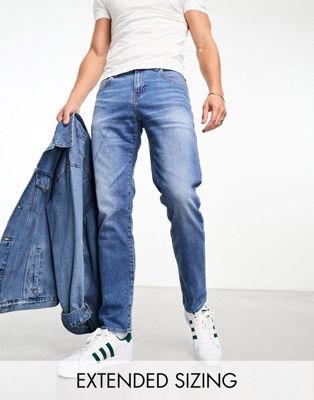 Asos Design Slim Jeans In Mid Wash Blue