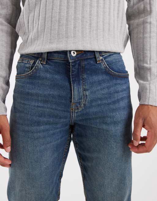 ASOS DESIGN slim jeans in mid wash blue, 4 of 5