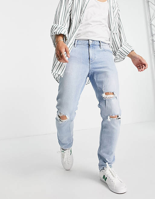 ASOS DESIGN slim jeans with knee rips in vintage light wash blue