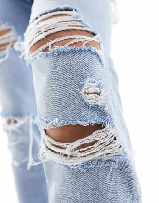 Jeans with best sale lots of rips