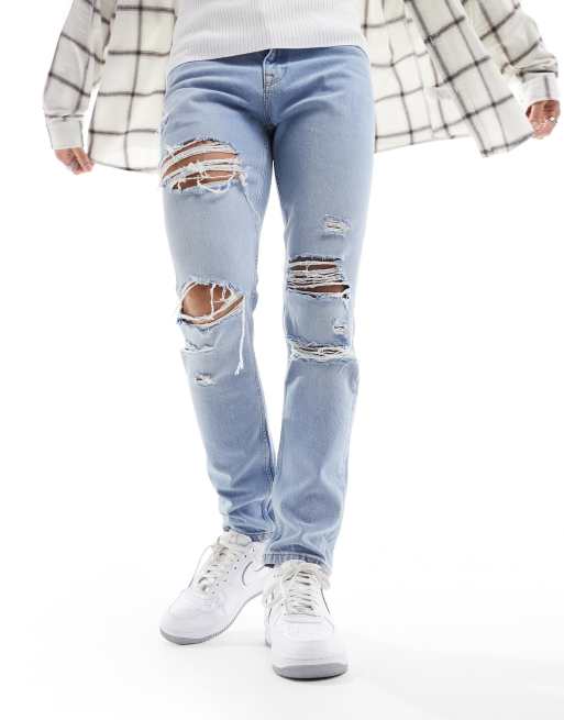 ASOS DESIGN slim jeans with rips in light wash blue