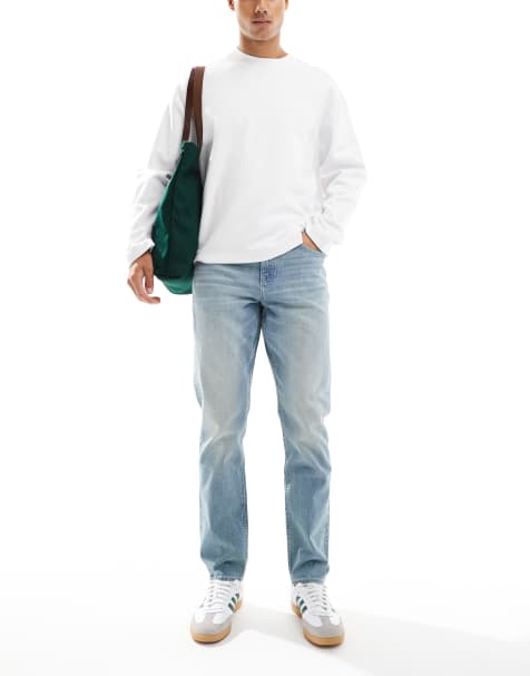 ASOS DESIGN slim jeans with tint in light wash blue - view 1