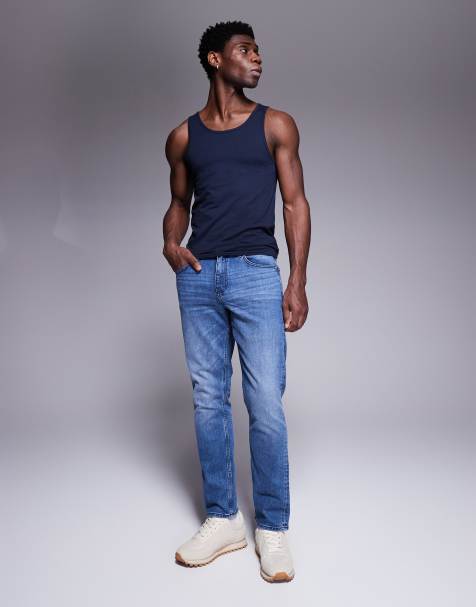 ASOS DESIGN slim jeans with tint in mid wash blue - view 1