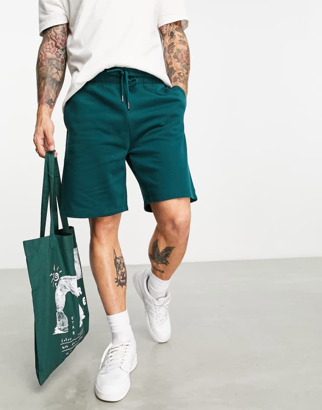 ASOS DESIGN slim jersey shorts in forest green