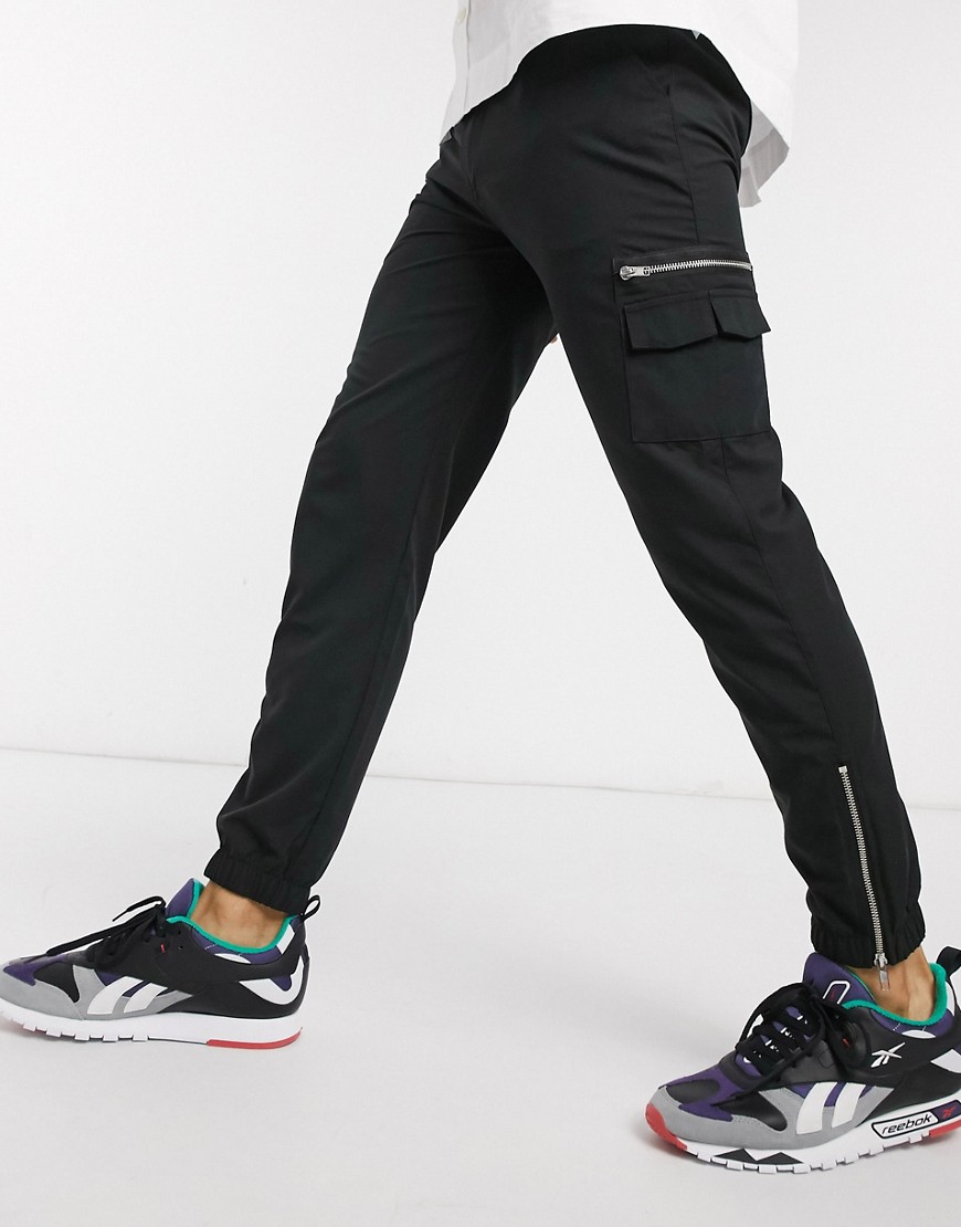 ASOS DESIGN slim joggers with MA1 pocket & zip pockets-Black