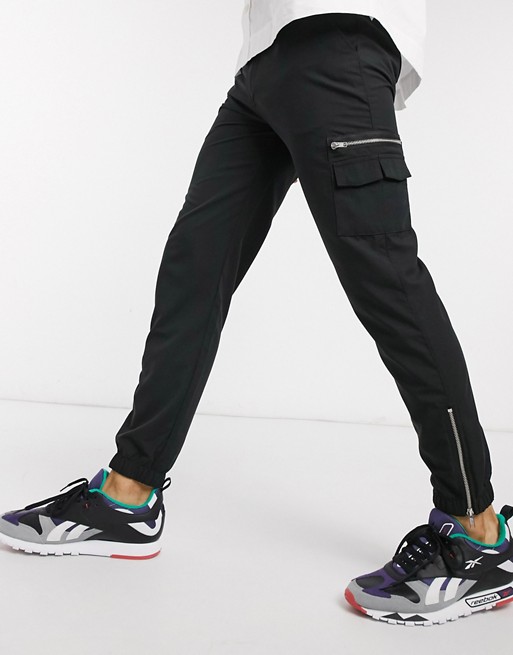 ASOS DESIGN slim joggers with MA1 pocket & zip pockets