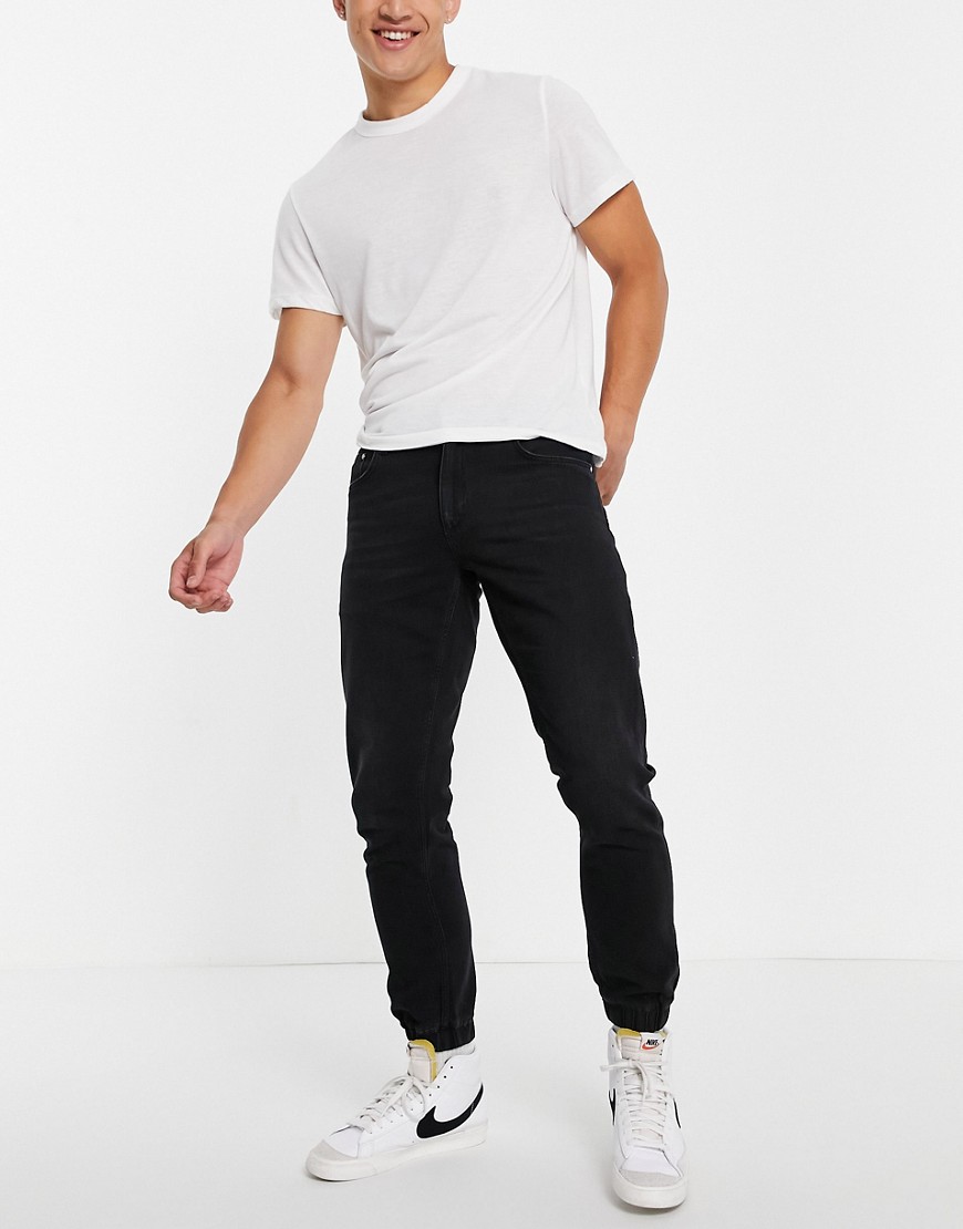 ASOS DESIGN slim lightweight denim jeans in washed black with elasticated hem
