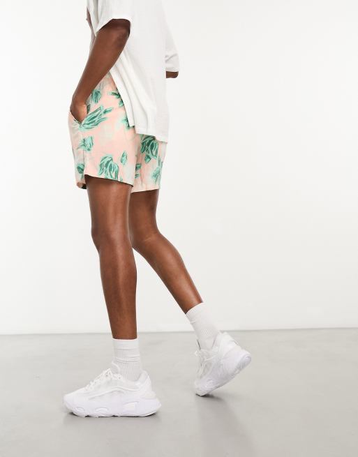 ASOS DESIGN slim linen shorts in shorter length in pink floral ASOS