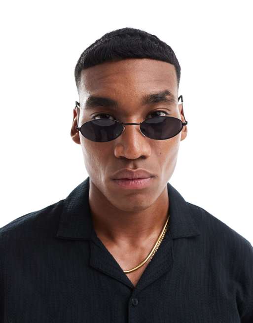 ASOS DESIGN slim metal oval sunglasses with smoke lens in black, 3 of 4