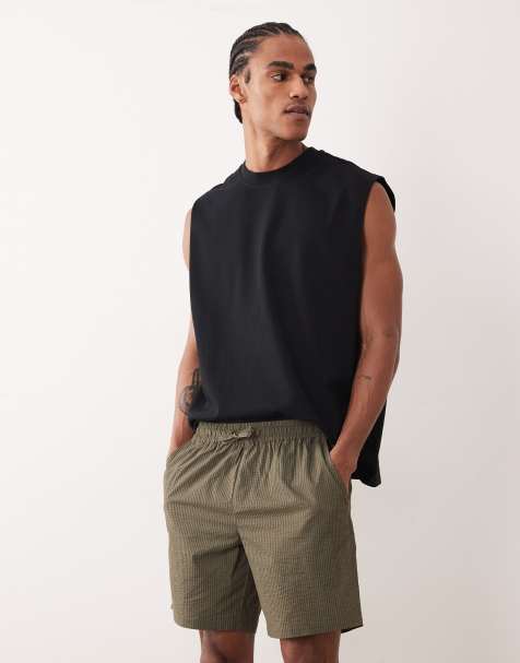 ASOS DESIGN slim mid length elastic shorts in khaki striped seersucker - view 1