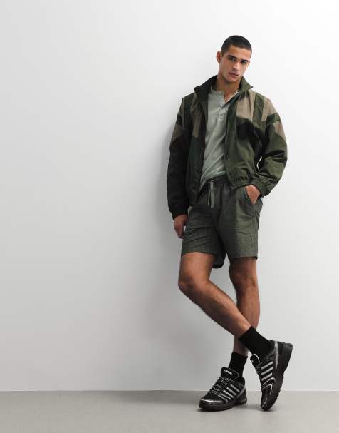 ASOS DESIGN slim mid length elasticated shorts in khaki stripe seersucker - view 1