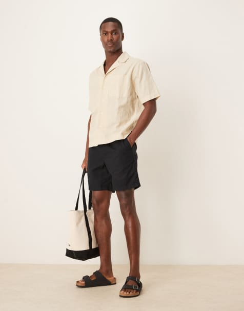 ASOS DESIGN slim mid length linen blend shorts in black - view 1