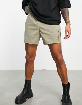 ASOS DESIGN slim nylon shorts in beige