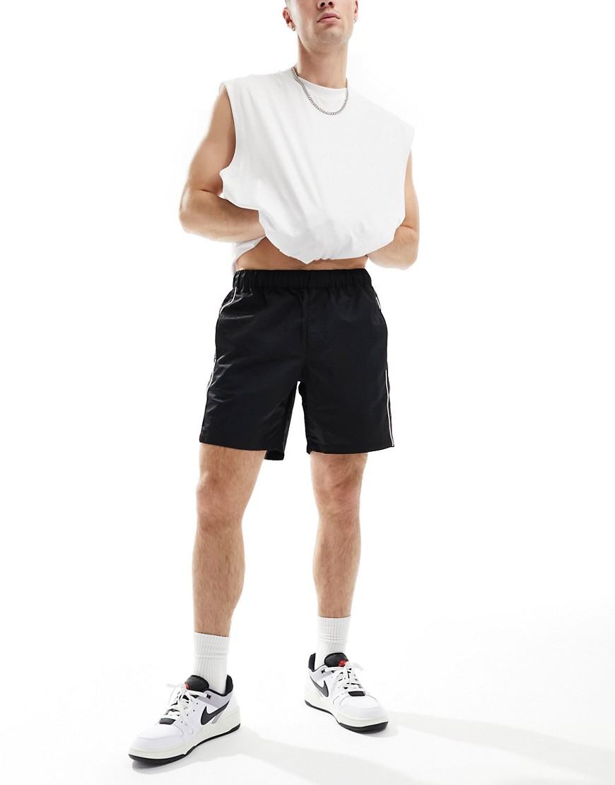 ASOS DESIGN slim nylon shorts with piping detail in black