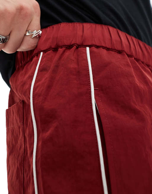 ASOS DESIGN slim nylon shorts with piping detail in burgundy, 4 of 5