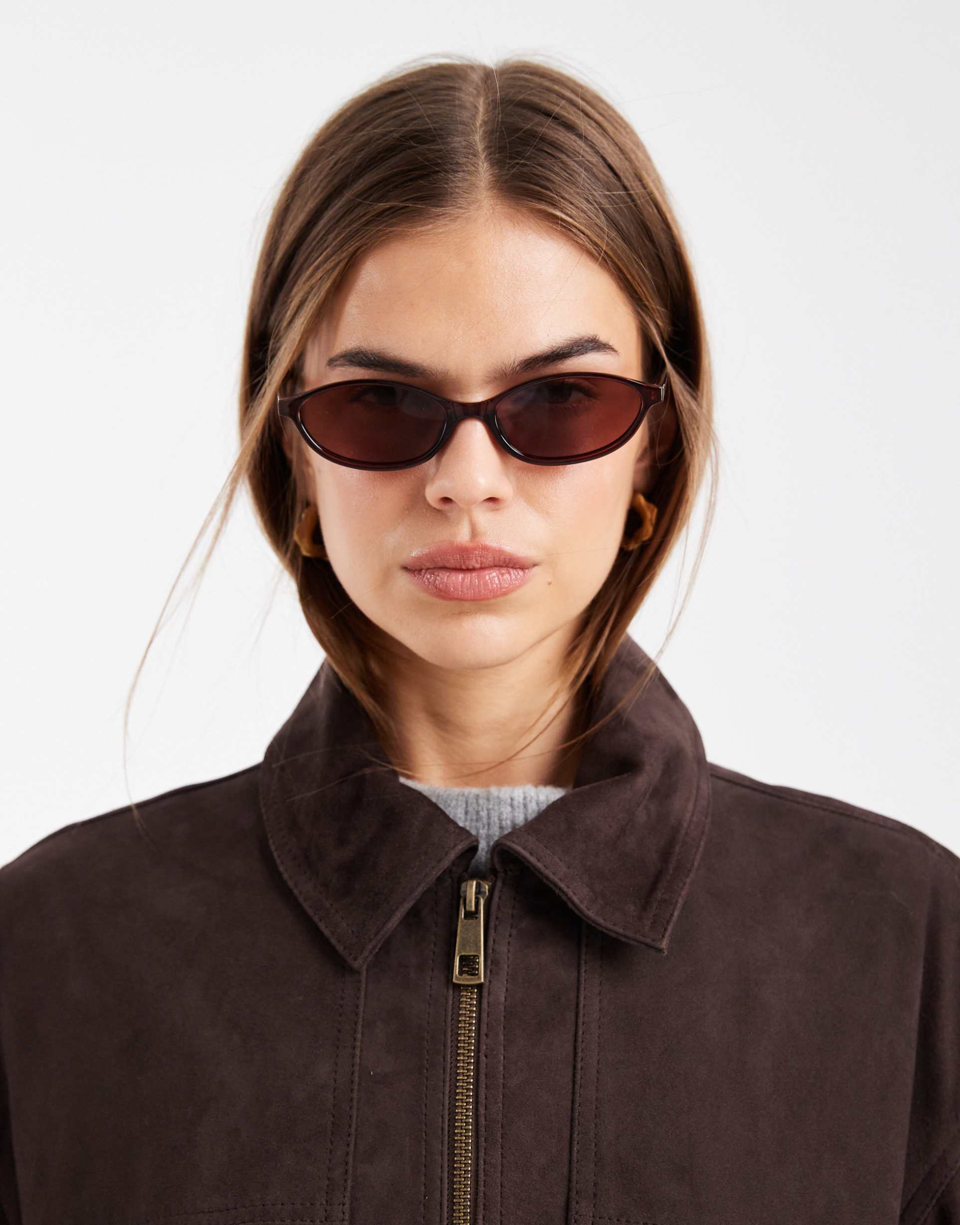 asos design slim oval sunglasses in milky brown