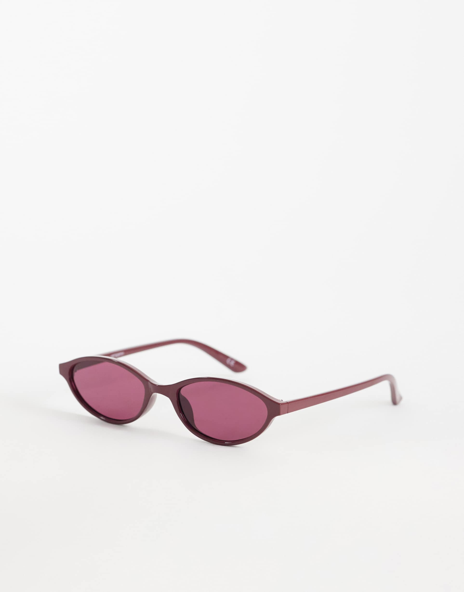 asos design slim oval sunglasses in tonal burg with pink lens