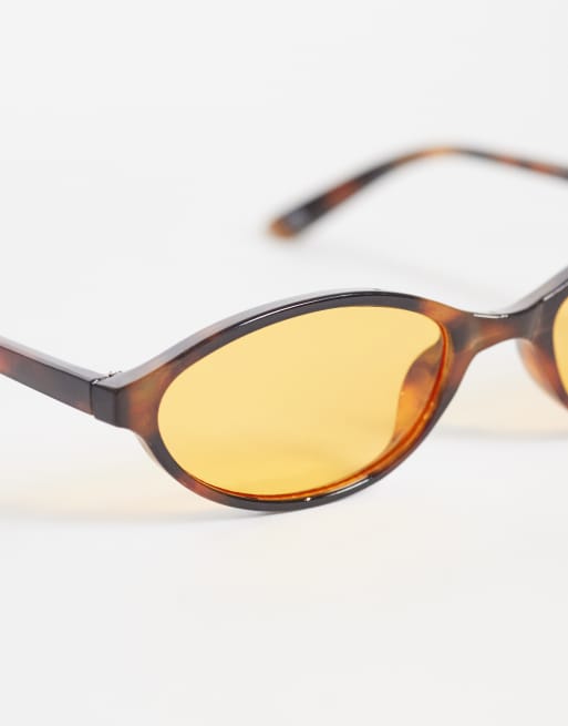 ASOS DESIGN slim oval sunglasses in tort with yellow lens, 2 of 3