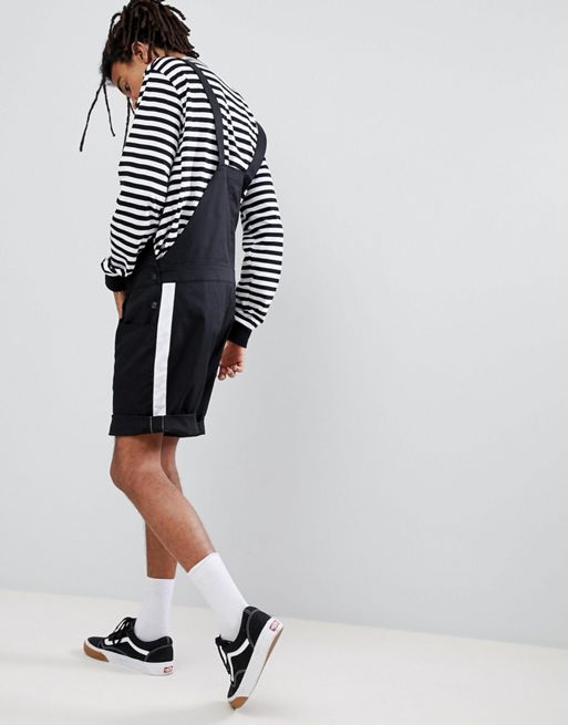 ASOS DESIGN jersey overalls in black with side stripe