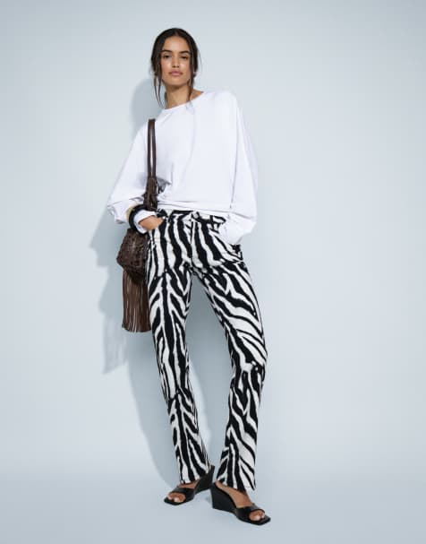 ASOS DESIGN slim pencil heel jeans in zebra print - view 1