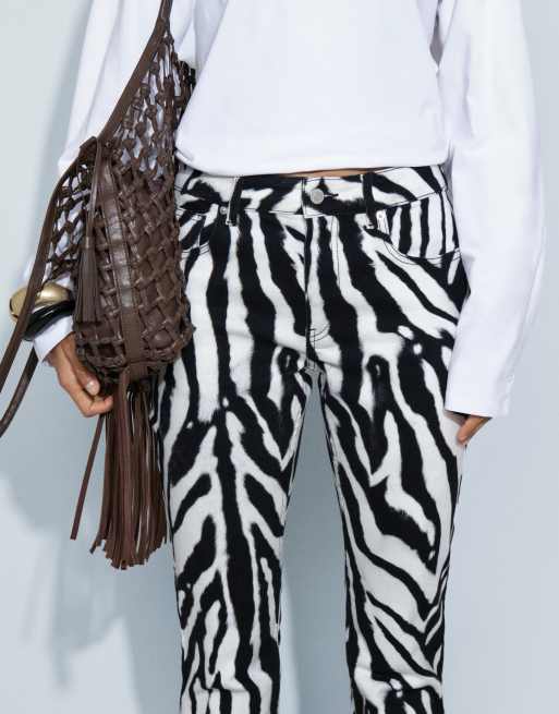 ASOS DESIGN slim pencil heel jeans in zebra print, 2 of 9