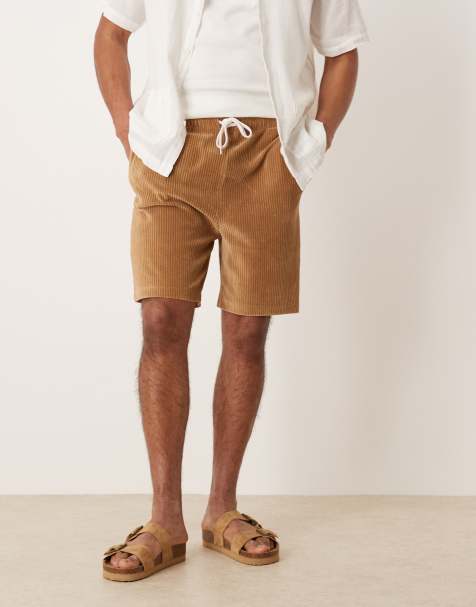 ASOS DESIGN slim ribbed velour shorts in beige - view 1