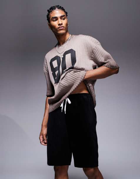 ASOS DESIGN slim ribbed velour shorts in black - view 1