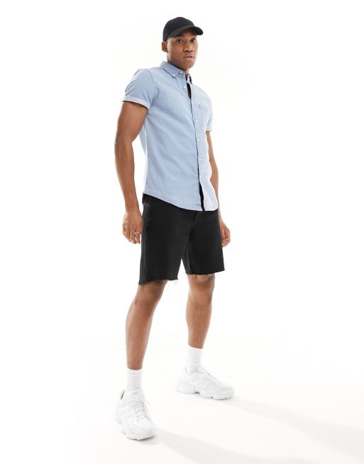 ASOS DESIGN slim roll sleeve denim shirt with button down collar in light blue wash, 3 of 4