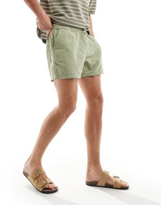 ASOS DESIGN slim shorter length linen shorts with elasticated waist in green