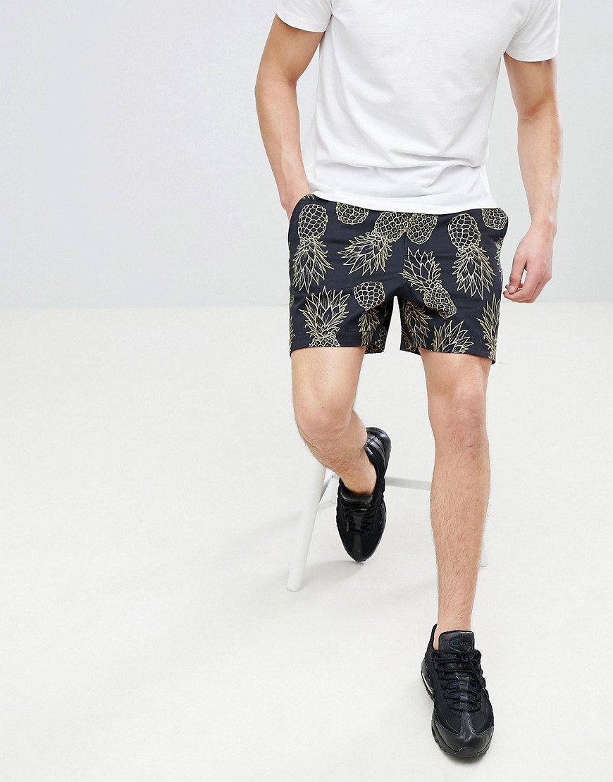 ASOS DESIGN slim shorter shorts in black with pineapple print