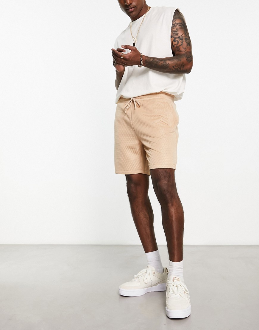 ASOS DESIGN slim shorts in beige quilted texture-Neutral