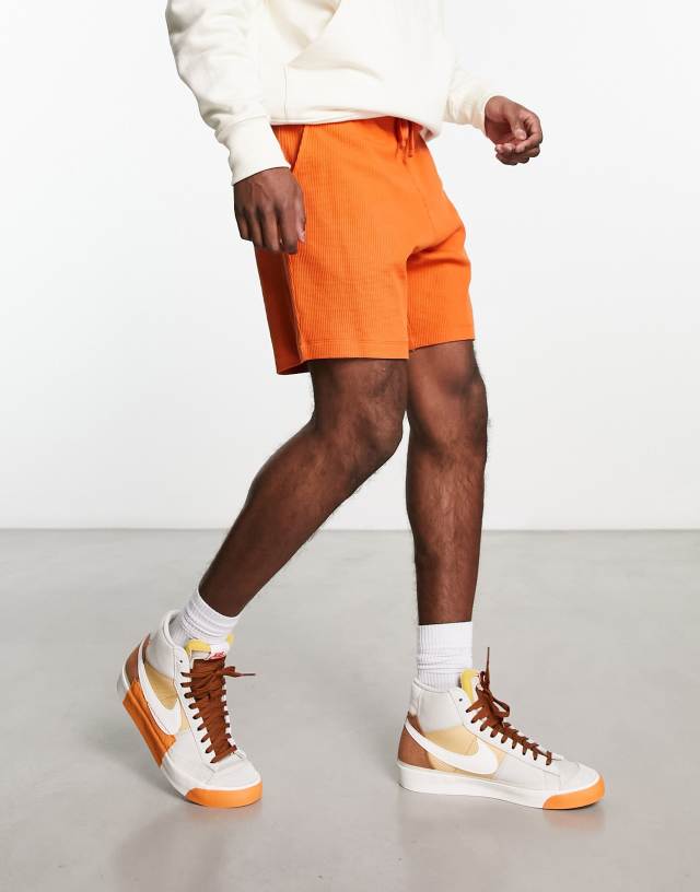 ASOS DESIGN slim shorts in burnt orange waffle