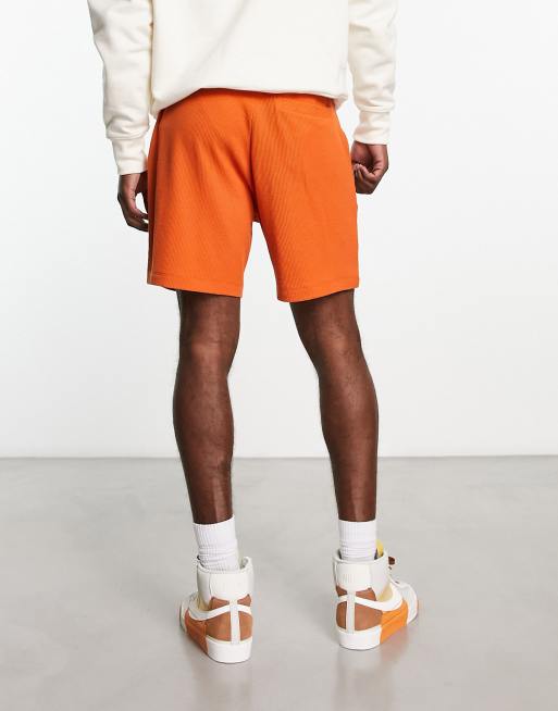 ASOS DESIGN slim shorts in burnt orange waffle