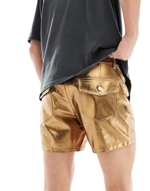 ASOS DESIGN slim shorts in gold metallic