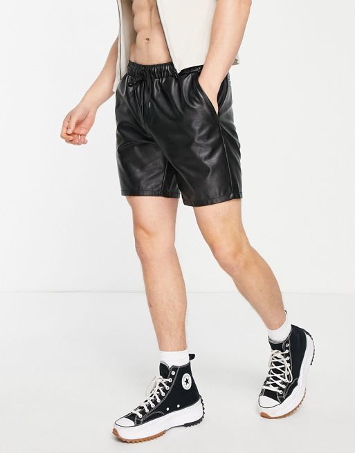 ASOS DESIGN slim shorts in extreme shorter length in black leather look