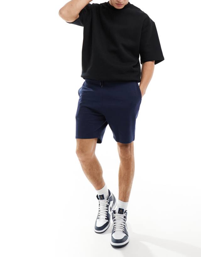 ASOS DESIGN - slim shorts in navy