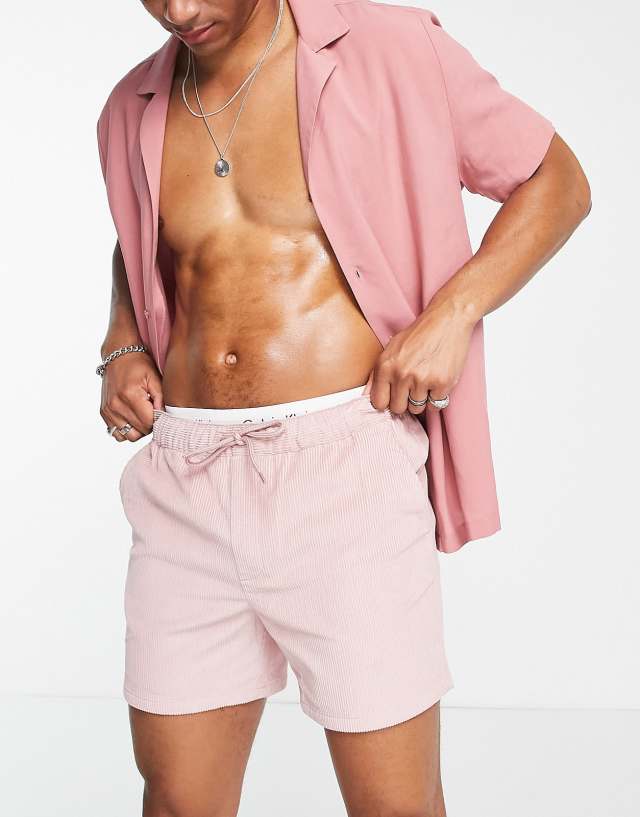 ASOS DESIGN slim shorts in pink cord