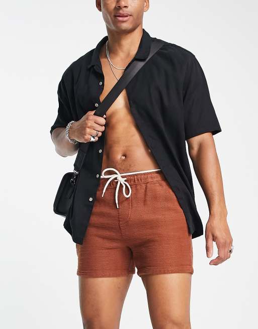 ASOS DESIGN slim shorts in rust orange natural look textured fabric 