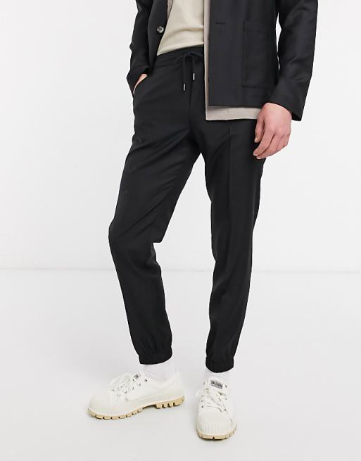 ASOS DESIGN slim soft tailored smart jogger in black 100% wool | ASOS