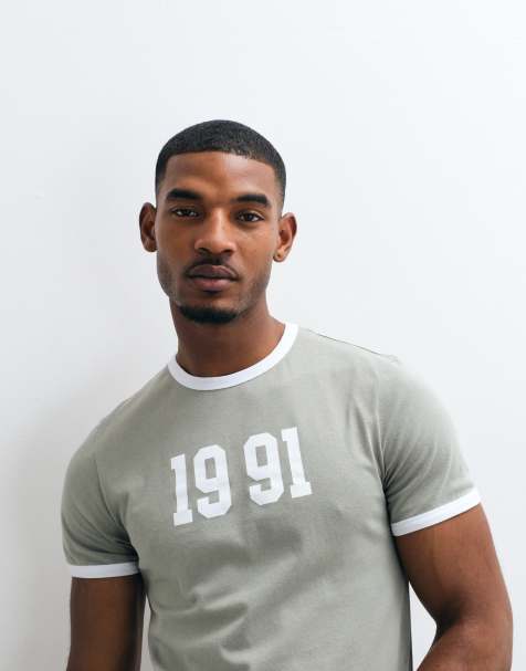 ASOS DESIGN slim t-shirt with 1991 graphic and double layer sleeves in green - view 1