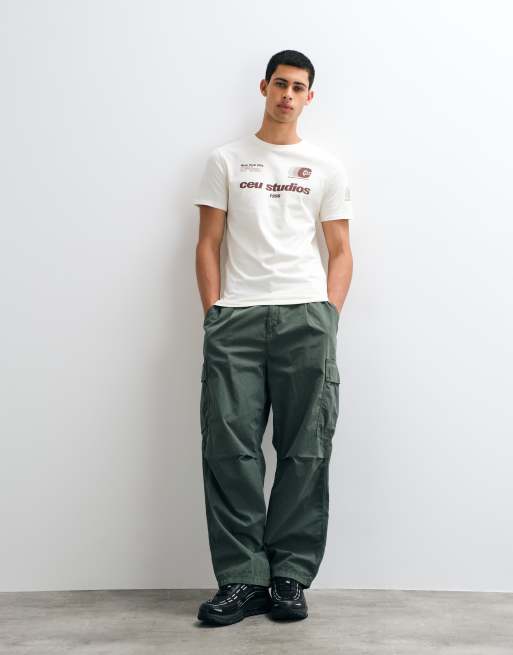 ASOS DESIGN slim t-shirt with football graphic in cream, 3 of 5