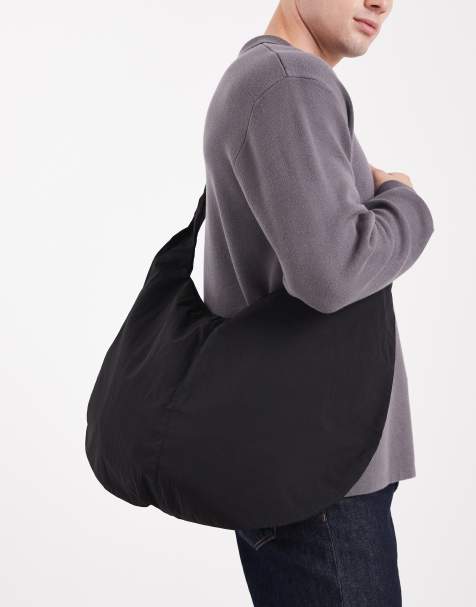 ASOS DESIGN sling bag in black - view 1