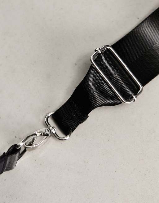 ASOS DESIGN sling bag with piping in black, 2 of 4