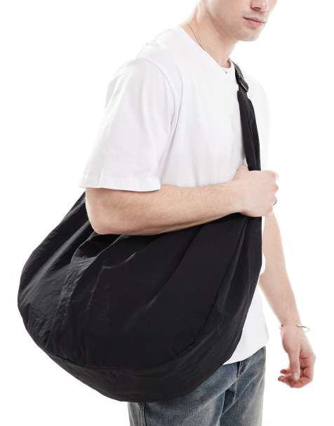 ASOS DESIGN sling cross body bag in black - view 1