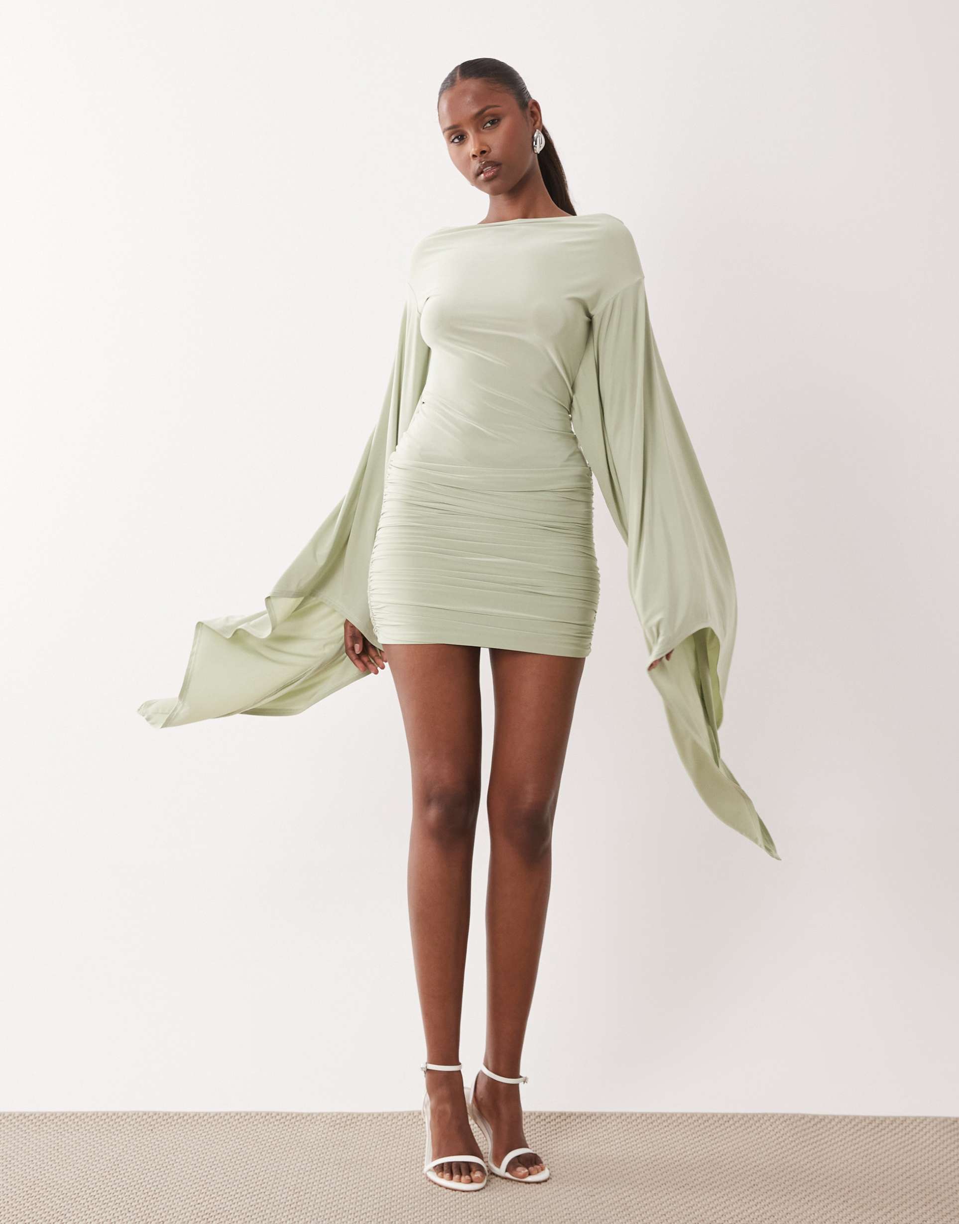 asos design slinky extreme batwing mini dress in sage green
