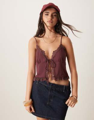 ASOS DESIGN slinky lace trim tie front top in berry - view 1