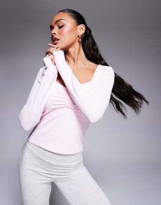 ASOS DESIGN ASOS DESIGN slinky long sleeve top with ruched bust in pastel pink